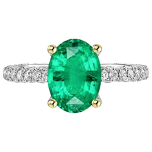 Oval Cut Fine Emerald ring in Two-Tone 14K Gold – side view