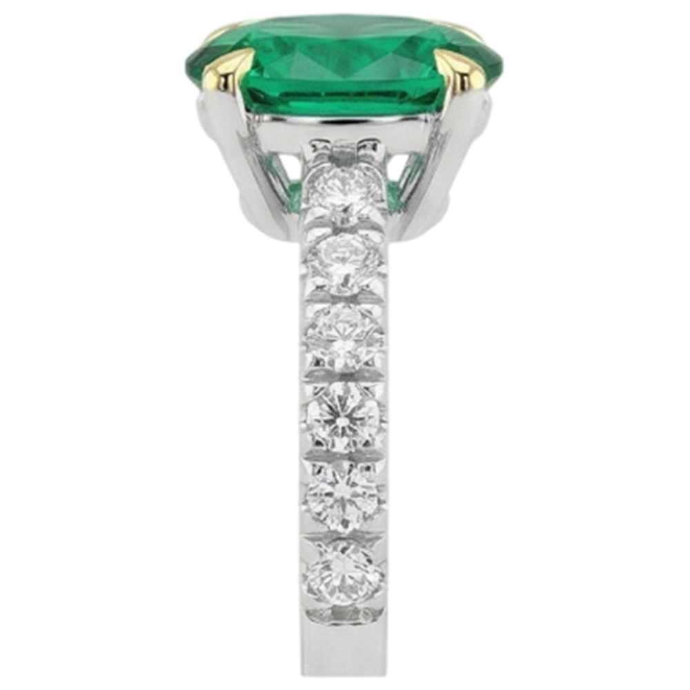 Oval Cut Colombian Emerald ring in Two-Tone 14K Gold – top view