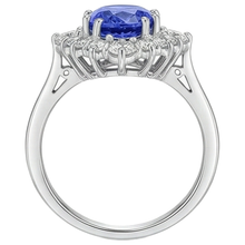 natural round tanzanite 5.20ct ring on white background