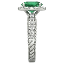 natural round emerald 3.50ct ring on white background