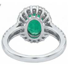 natural round emerald 2.50ct ring on white background