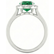 natural round emerald 4.50ct ring on white background