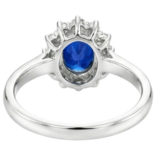 natural round sapphire 4ct ring on white background