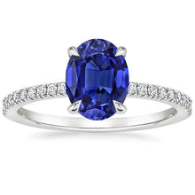 Oval Sapphire Ring With Round Diamonds