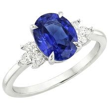 Oval Solitaire Blue Sapphire Ring With Pear Side Stones 4.50 Carats