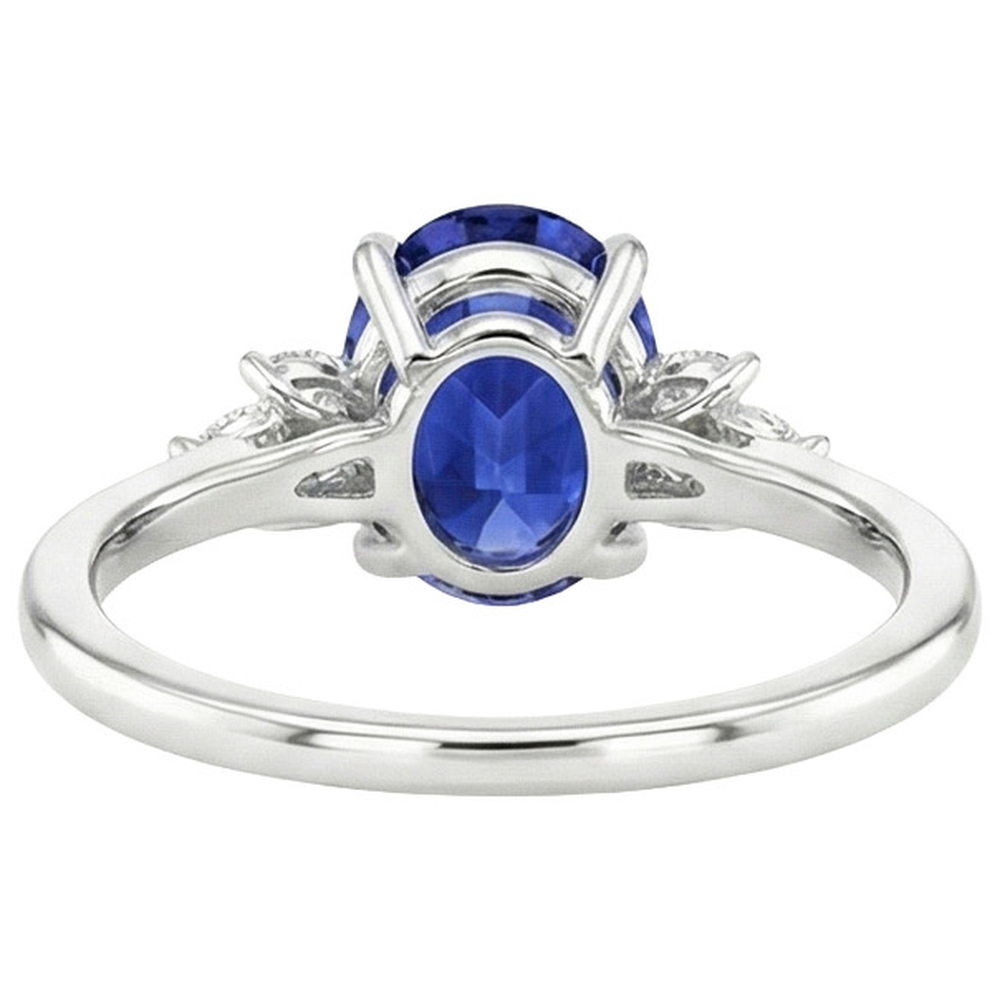 Oval Solitaire Blue Sapphire Ring With Pear Side Stones 4.50 Carats