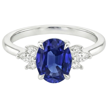 Oval Solitaire Blue Sapphire Ring With Pear Side Stones 4.50 Carats