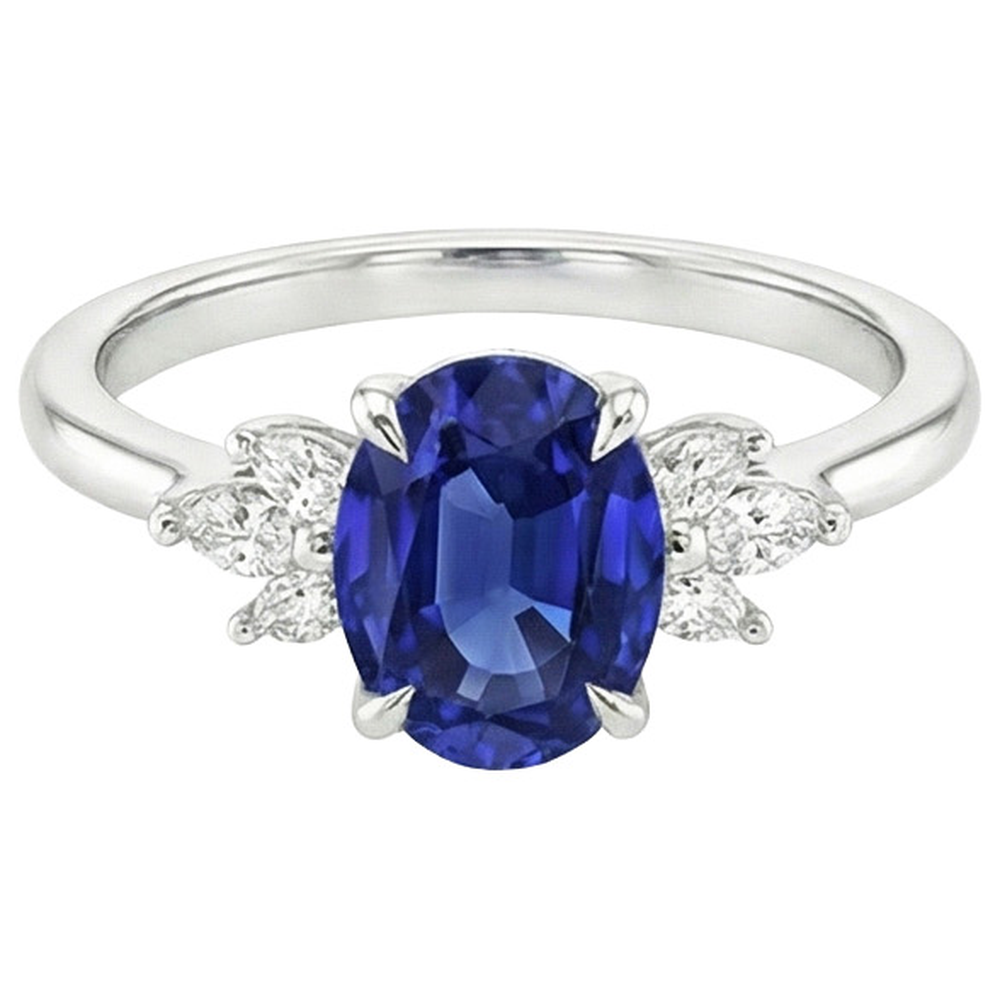 Oval Solitaire Blue Sapphire Ring With Pear Side Stones 4.50 Carats