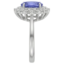 natural round tanzanite 11.25ct ring on white background