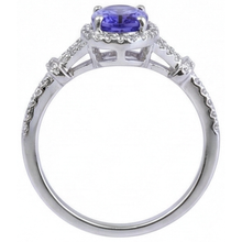 natural round tanzanite 3.60ct ring on white background