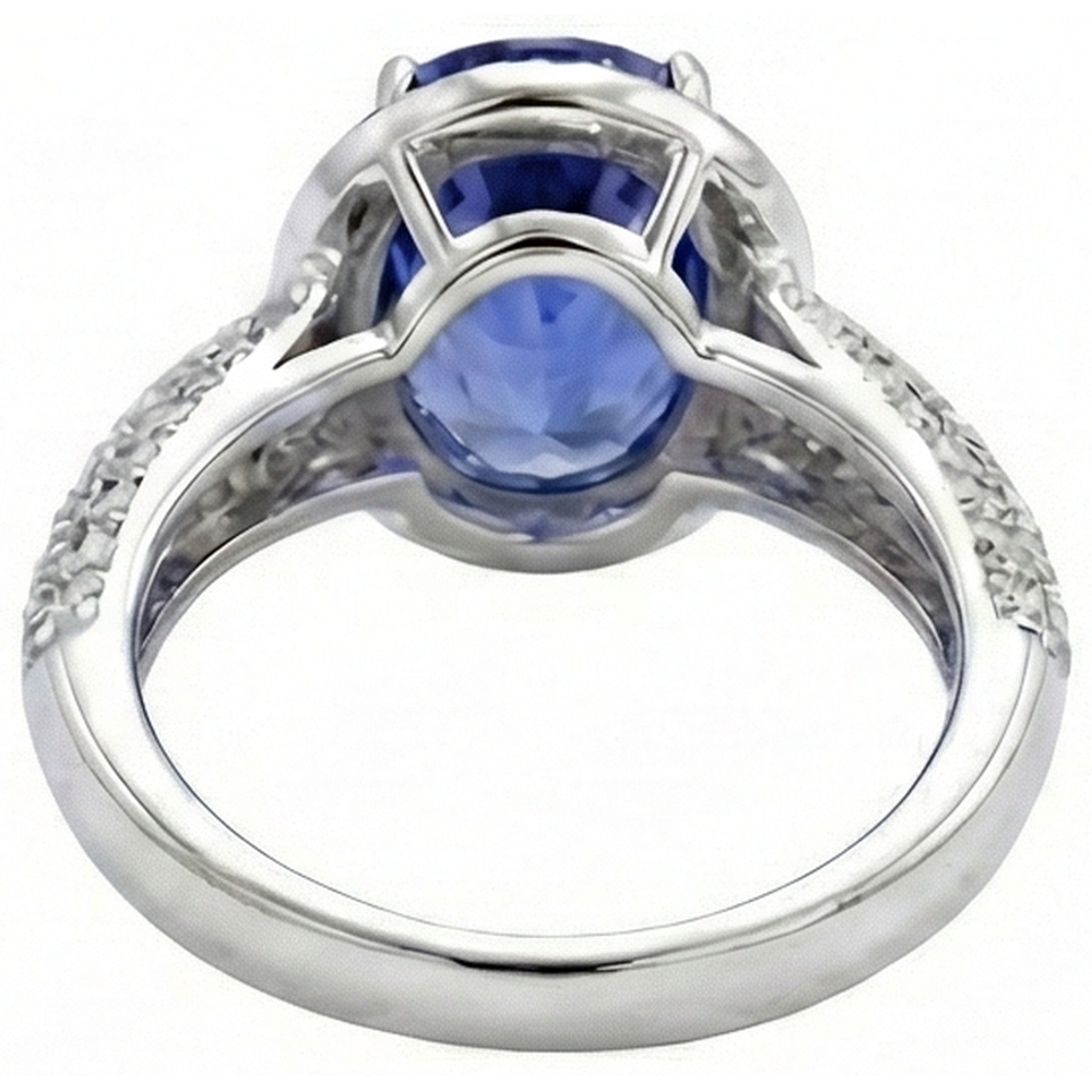 natural round tanzanite 7ct ring on white background