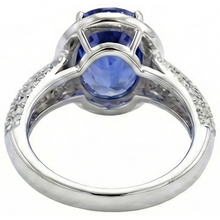 natural round tanzanite 7ct ring on white background