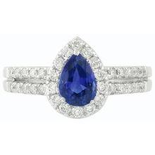 natural round sapphire 4ct ring on white background