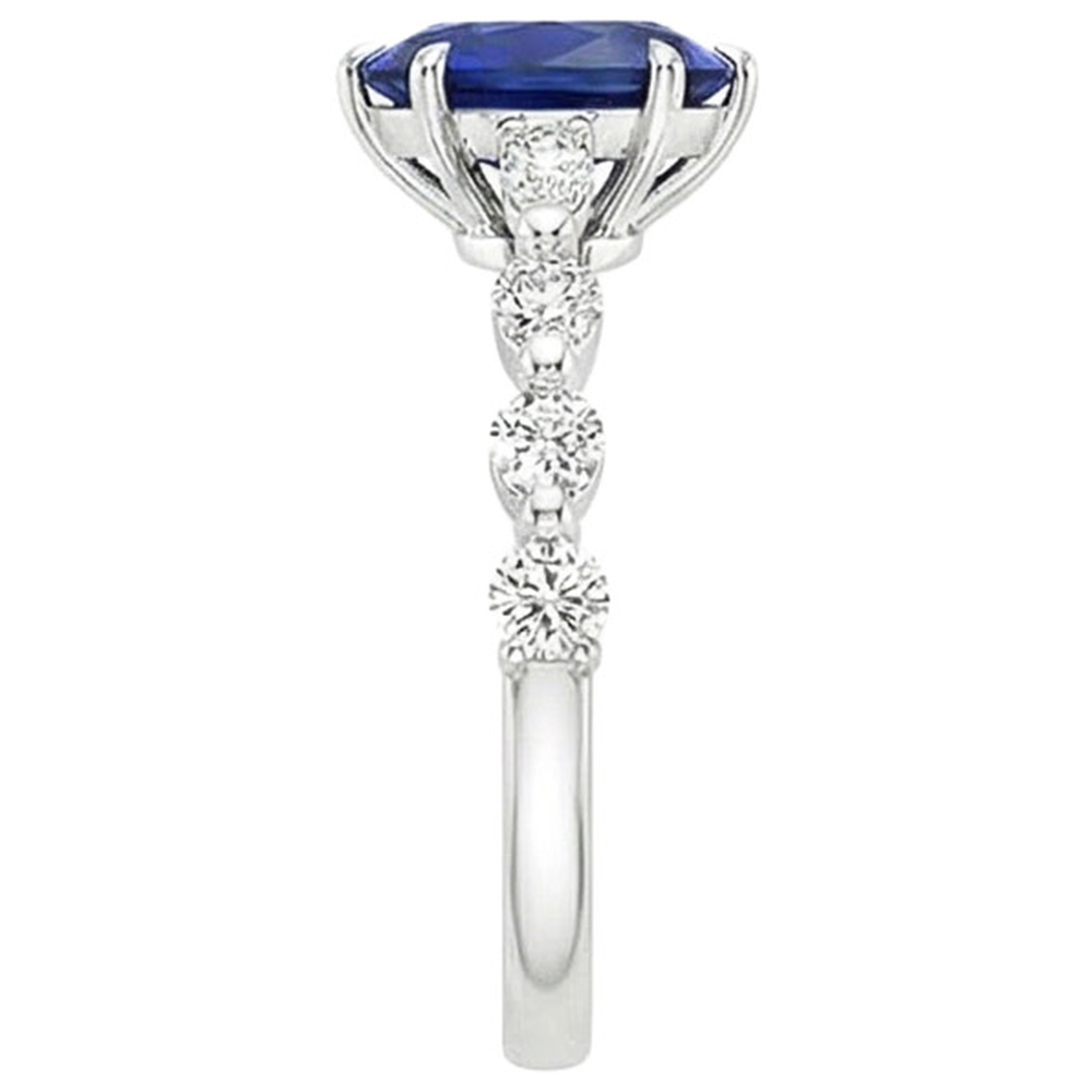 natural round sapphire 5ct ring on white background