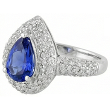 natural round tanzanite 4.40ct ring close up detail