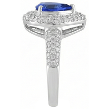 natural round tanzanite 4.40ct ring on white background