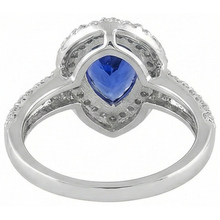 natural round tanzanite 4.40ct ring with diamond accents