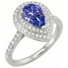 natural round tanzanite 5.25ct ring close up detail