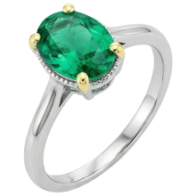 Colombian Emerald Oval Cut Colored Stone Ring in 14K Two Tone Gold – angle view