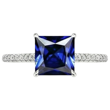natural round sapphire 6ct ring on white background
