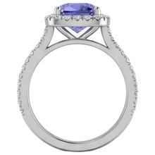 natural round tanzanite 4.50ct ring on white background