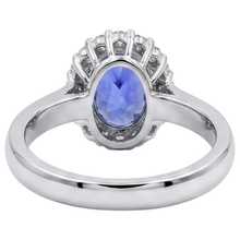 natural round tanzanite 3.70ct ring on white background