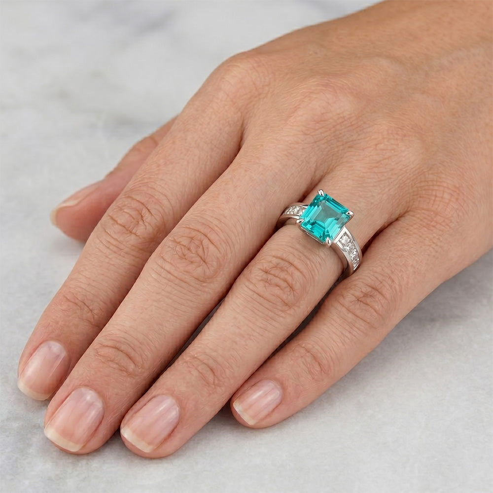 Refined Halo Ring – Neon Paraiba 3 ct from HarryChadEnt