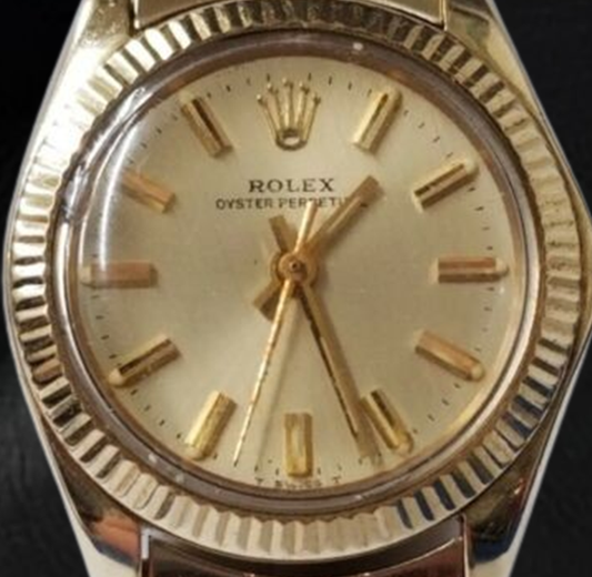 Rolex Oyster Prepetual 24 mm Champagne Stick Dial Yellow Gold Watch