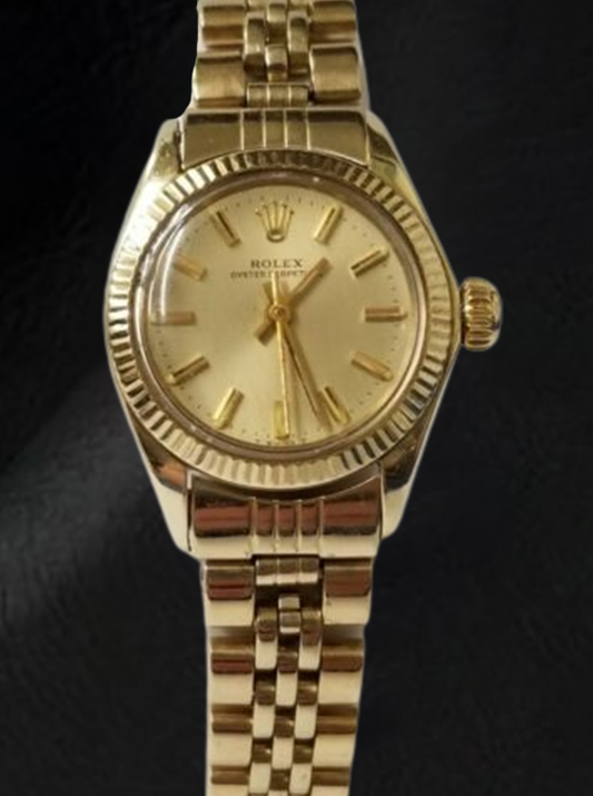 Rolex Oyster Prepetual 24 mm Champagne Stick Dial Yellow Gold Watch