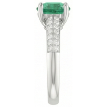 natural round emerald 2.60ct ring on white background