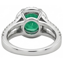 natural round emerald 3.80ct ring on white background