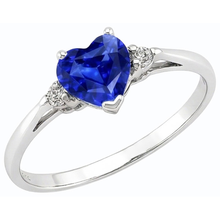 natural round sapphire 1.75ct ring on white background