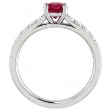 natural round ruby 2ct ring on white background