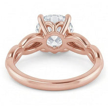 natural round diamond 2ct ring on white background