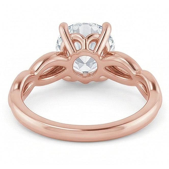 natural round diamond 2ct ring on white background