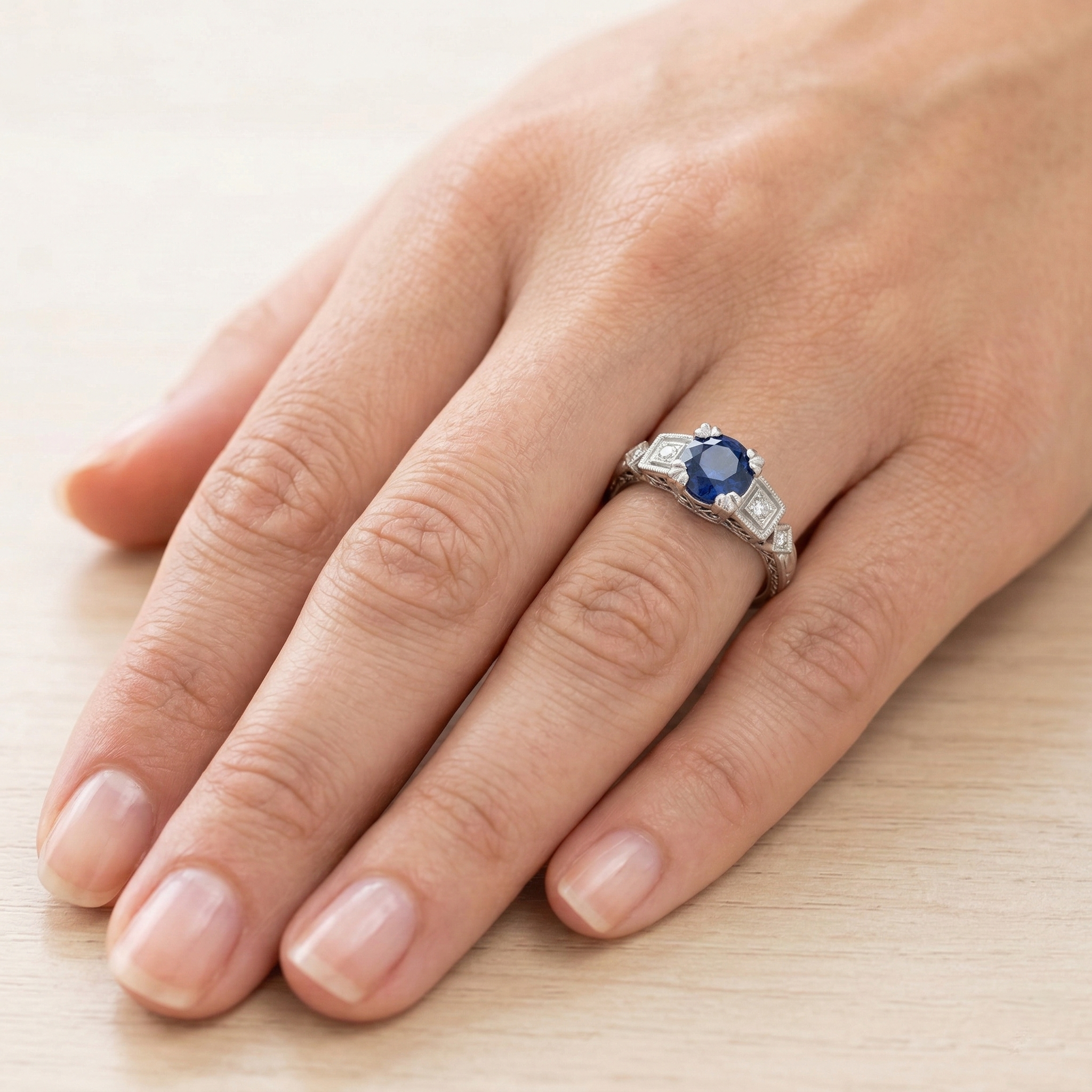 natural round sapphire 1.65ct ring on white background