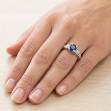 natural round sapphire 1.65ct ring on white background