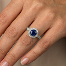 natural round sapphire 3ct ring on white background