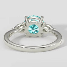 Round Paraiba Tourmaline Ring Three-Stone