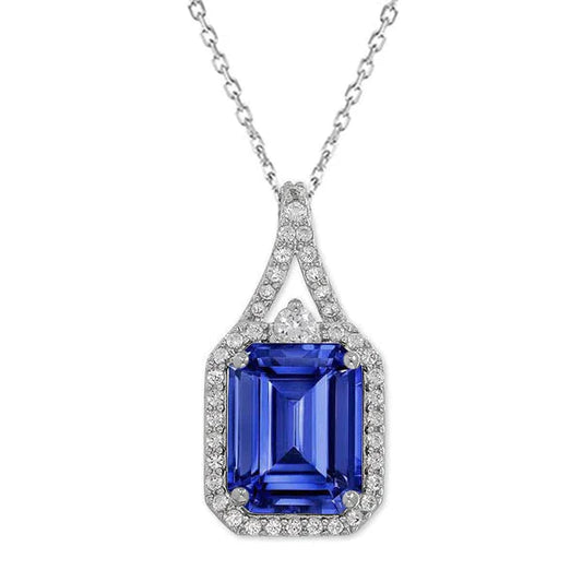 Step Cut Cornflower Blue Sapphire ring in 14K White Gold – main view