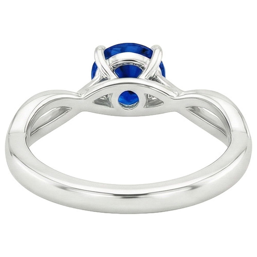 natural round sapphire 2ct ring on white background