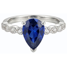 natural round sapphire 3.50ct ring on white background