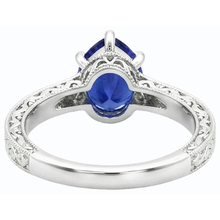 natural pear sapphire 2ct ring close up detail