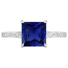 natural round sapphire 6ct ring on white background