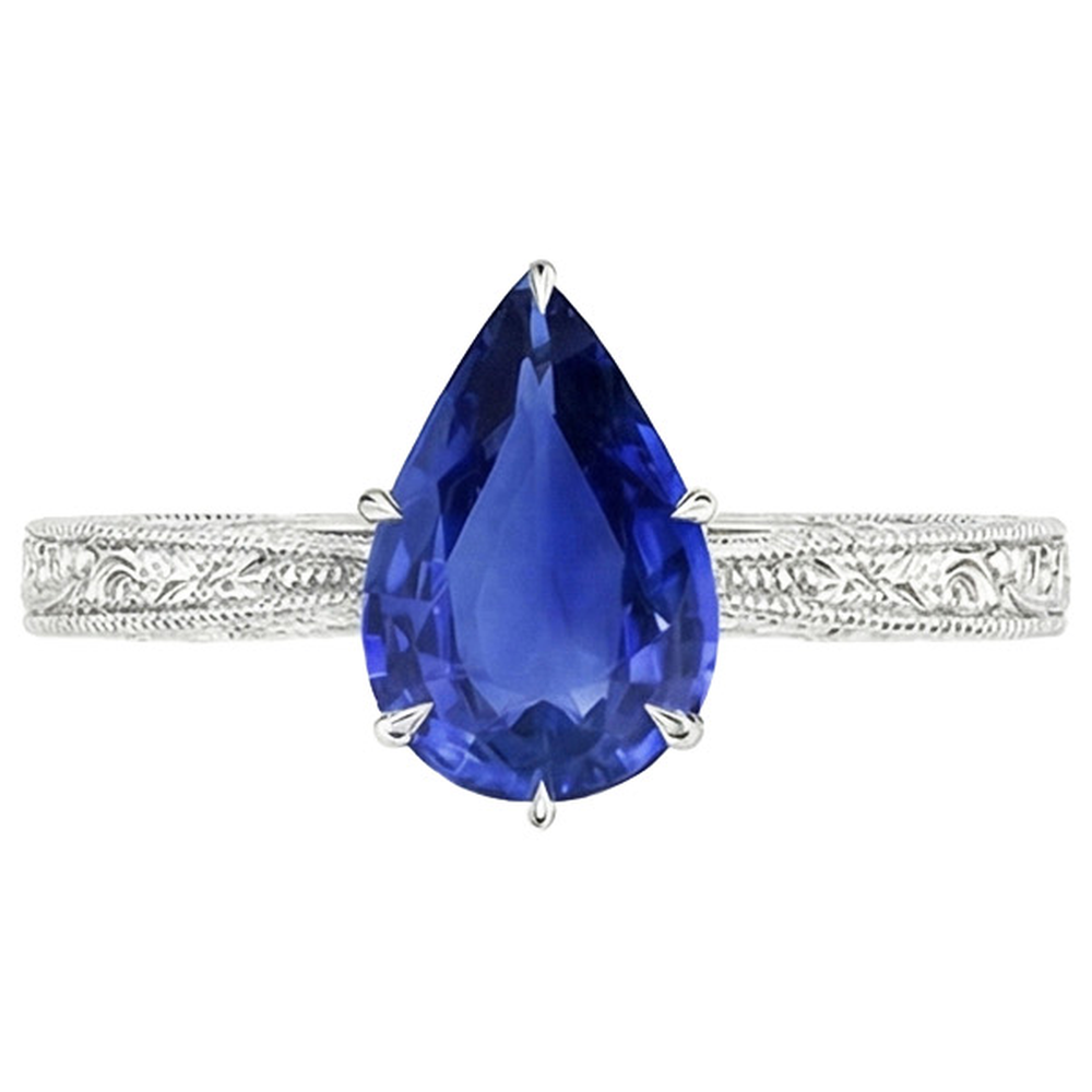 natural pear sapphire 2ct ring profile view