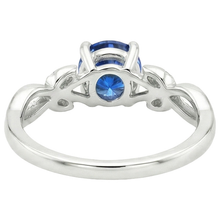 natural round sapphire 2ct ring on white background