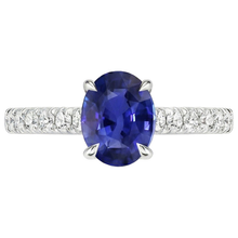 natural round sapphire 4ct ring on white background
