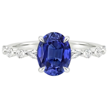 natural round sapphire 4ct ring on white background