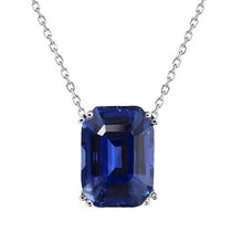 Emerald Cut Blue Sapphire ring in 14 Karat White Gold – main view