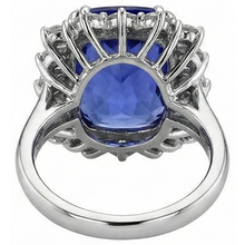 natural round tanzanite 6.50ct ring with diamond accents